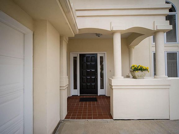 1623 Corniche street is situated on a quiet cul-de-sac with private access to south shore harbor.