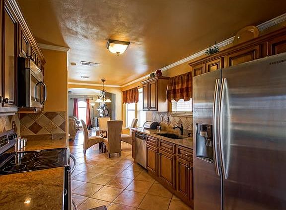 5th image of 11617 N Adams Ct