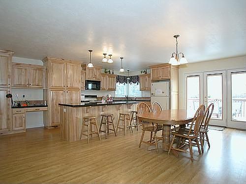 Enormous kitchen has new granite counters and new cabinets