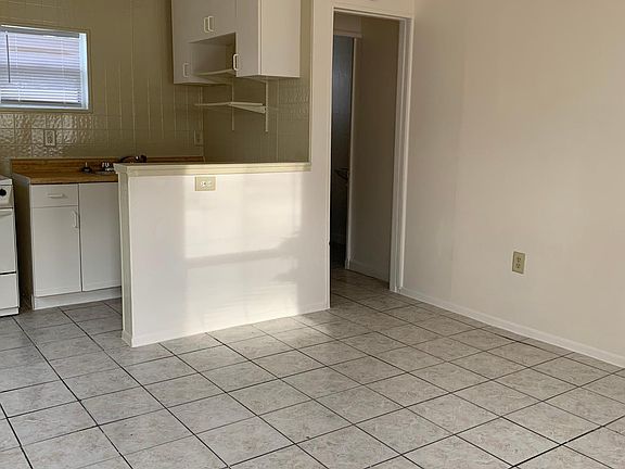 Kitchen and door to bathroom #1