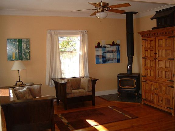 Living room with cozy wood burning stove