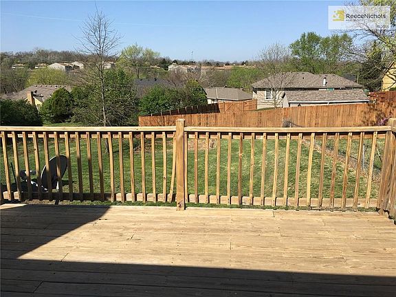 Very nice newly power washed deck overlooks & walks down to large back yard!