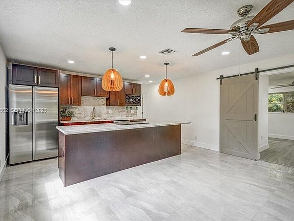 5th image of 1480 W 36th St