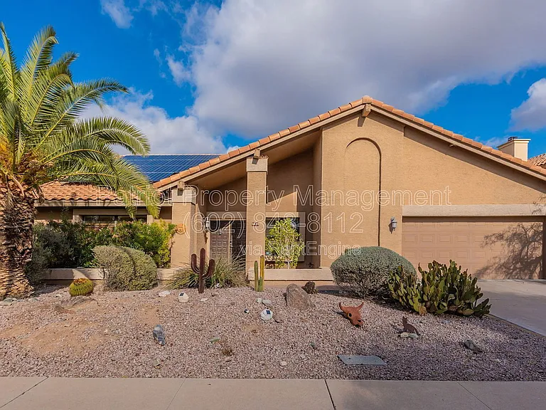 9910 E Sutton Dr — Photo 1