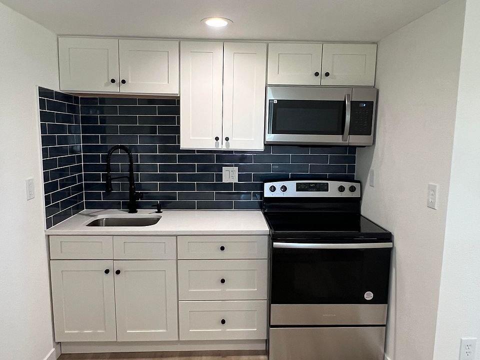 NEW kitchen with stainless steel appliances