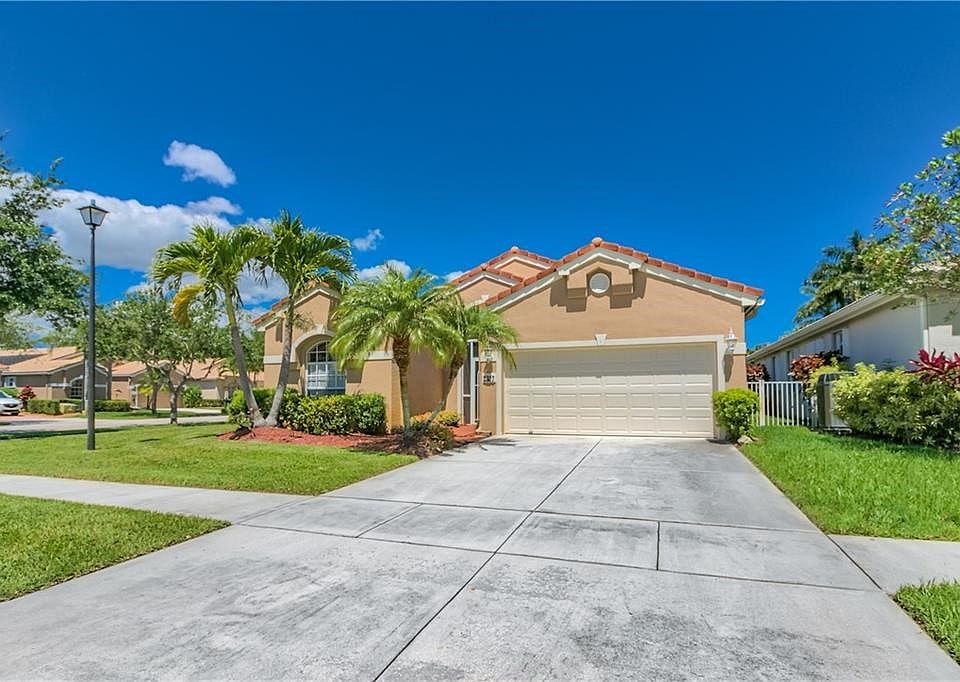 Mint condition CBS home on one of the most desirable streets in Summerfield