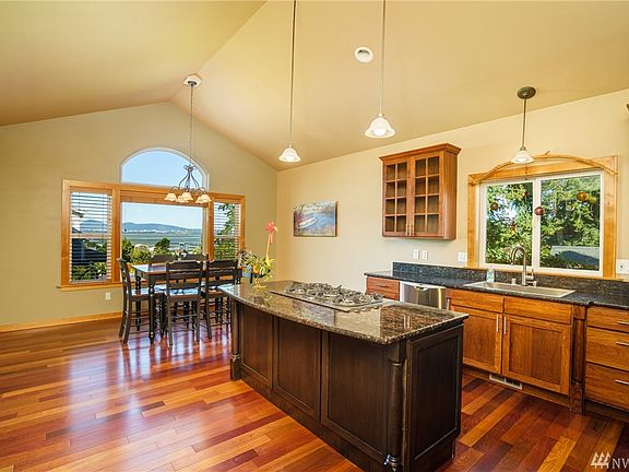 Rich wood tones in the kitchen and a view with your morning coffee