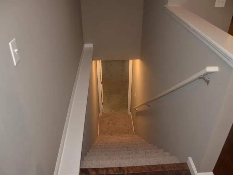 basement stairs off of front door