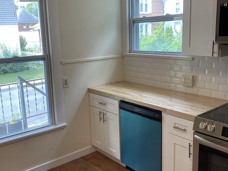 New Kitchen, dish-washer and stove.