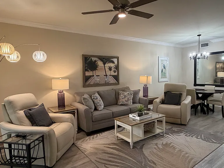 Remodeled living room and furniture; two new comfortable leather motion recliners with phone charging port.