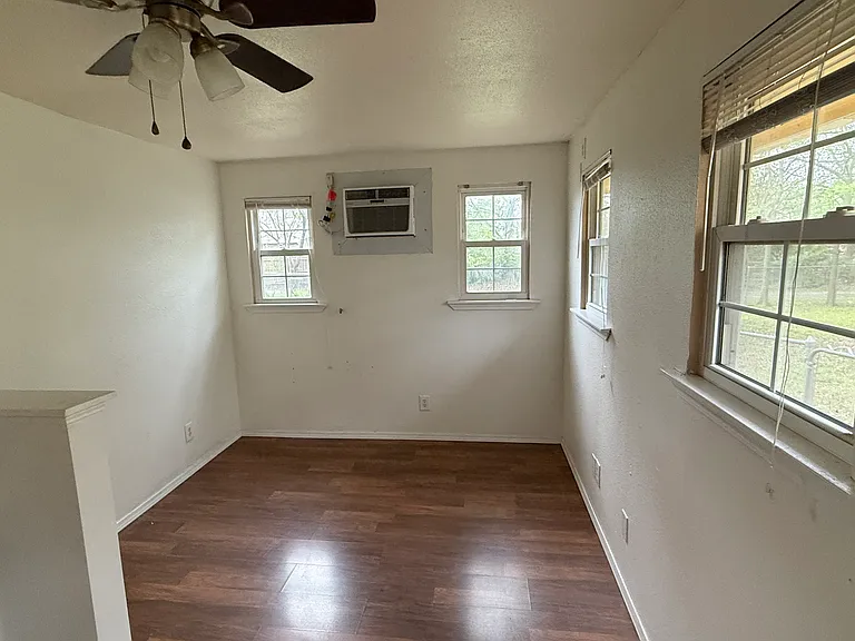 Efficiency Apartment in rear with seperate parking area off of alley