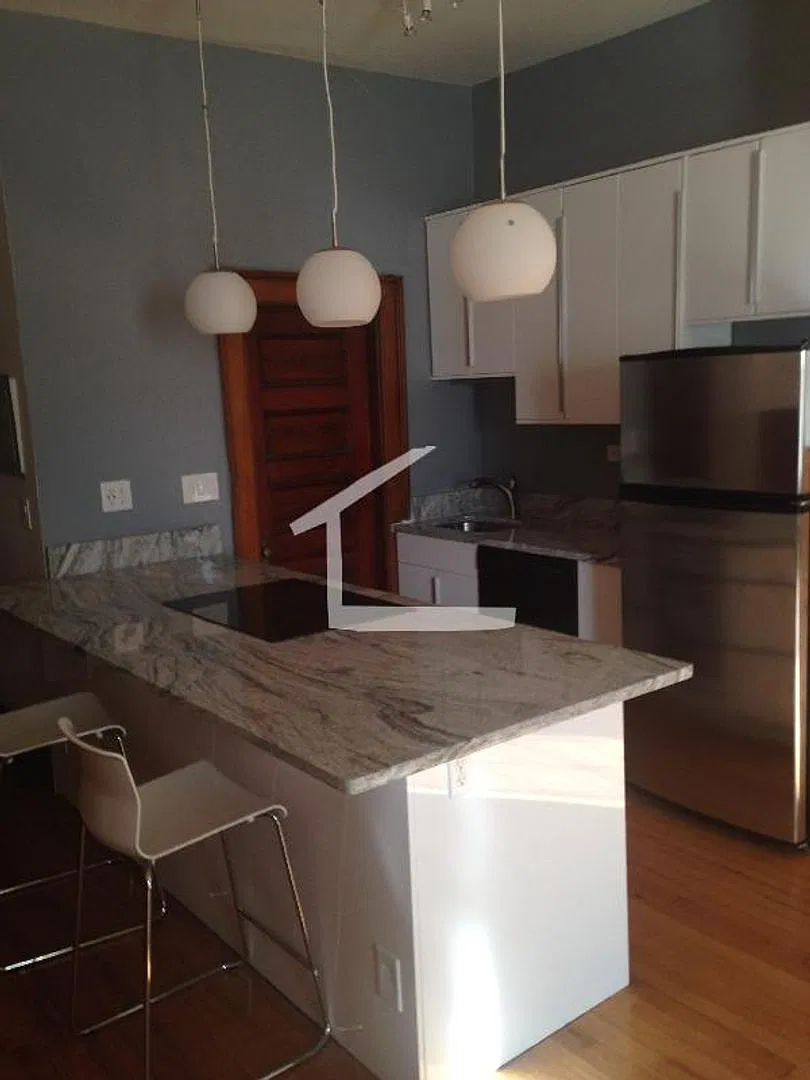 1BR w/ Heat & Hot Water Included | Renovated Kitchen — Photo 2