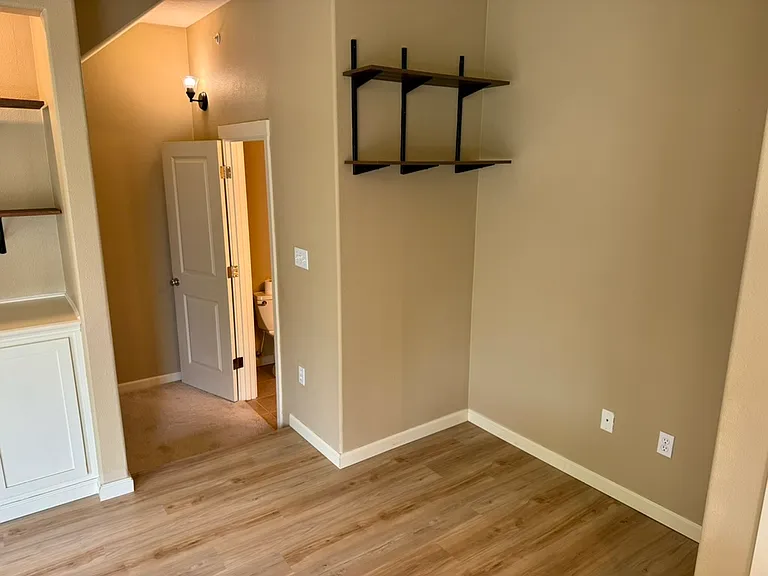 Office space and half bath on living room floor