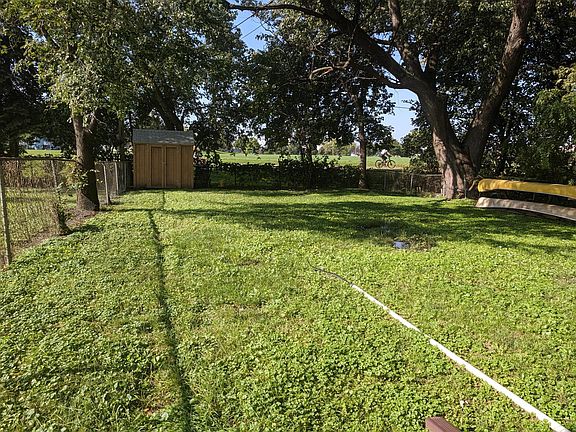 Back yard, overlooking the park. Lovely during Spring/Summer/Fall