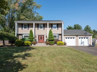 8 Farm Tree Rd, Manalapan, NJ 07726