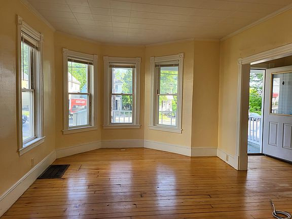 Huge living area with lots of light and tall ceilings!