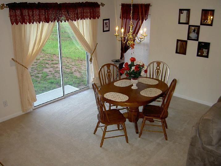 Beautiful dining room furniture and drapes included!