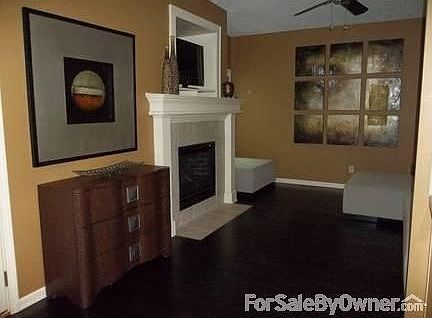 Hearth Room Fireplace
						:
						Front hearth room with window, fireplace, tv and stereo speakers.