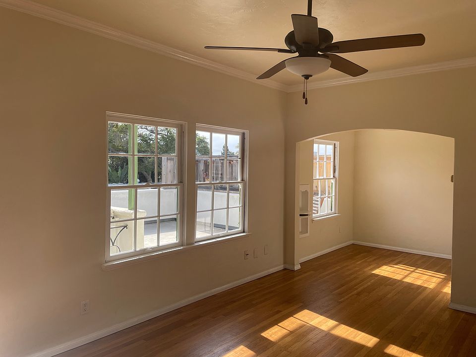 living room and dining room looking out on deck