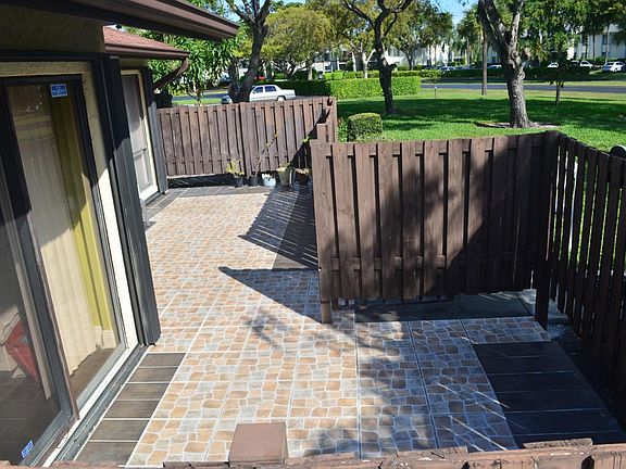 Fenced Tiled Patio