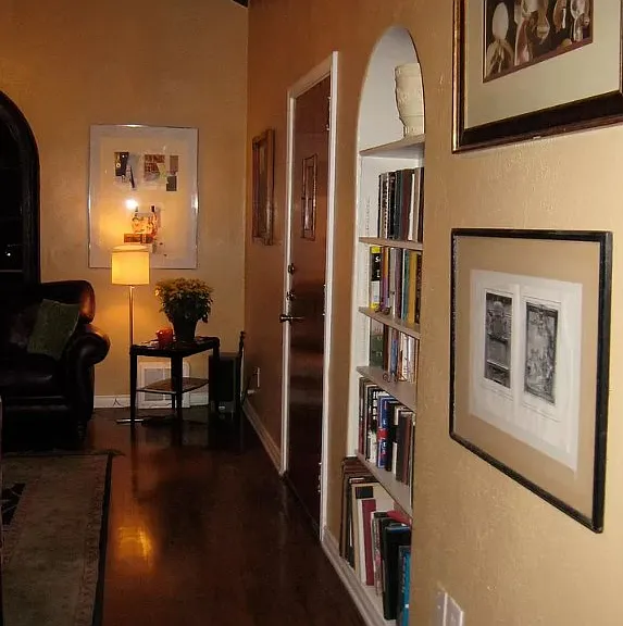 Built in period 1930s finishes throughout the home such as arched bookcases and vaulted ceilings