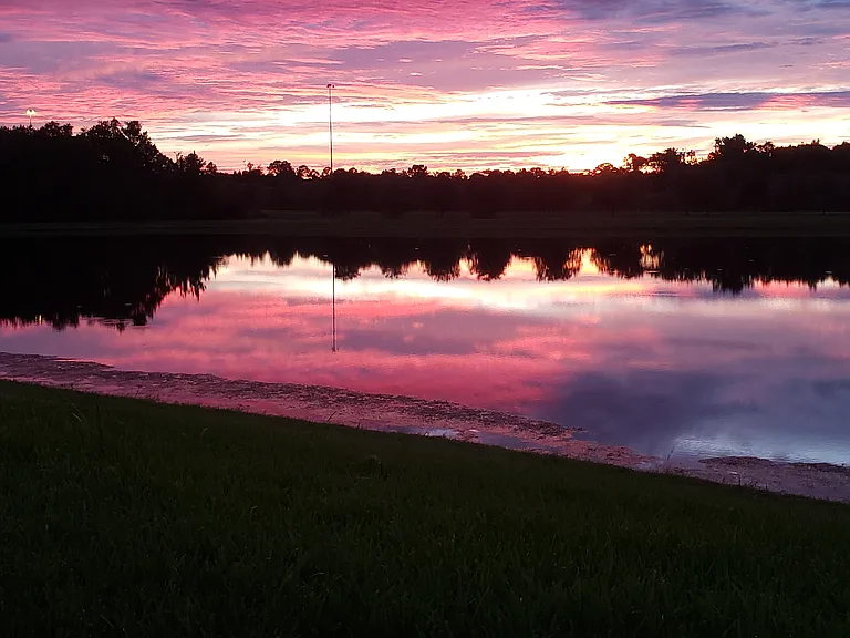 Backyard Lake view during Summer Sunset