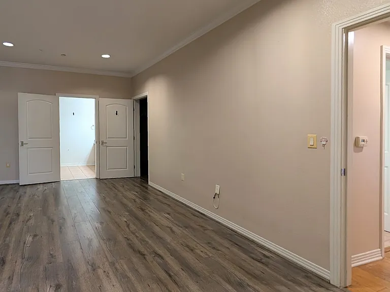 Another view of primary bedroom