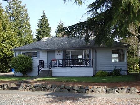 Fantastic home in Genesee Hill. Note the front porch sitting area.