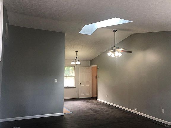 View from front door into living room and eat-in kitchen.