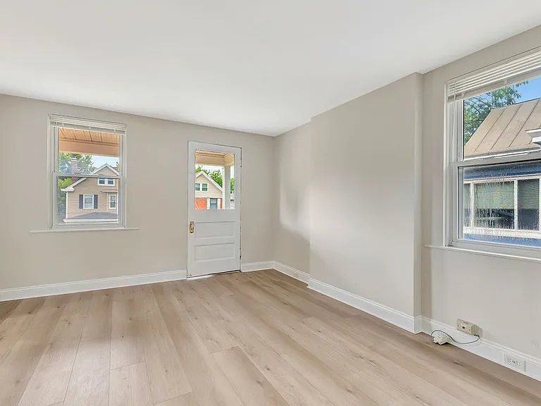 Another photo of the living room, the door in this photo leads to the private balcony.