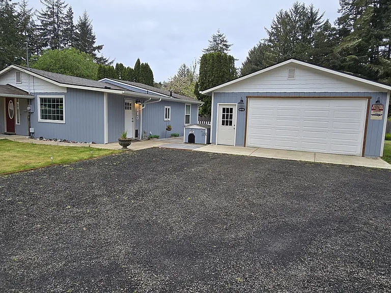 Front of home. 1/2 acre, fully fenced, well and septic (NO water/sewer bill each month!!)