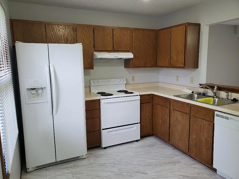 Kitchen with late model appliances