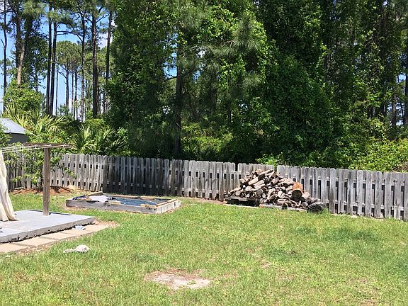 Fenced Backyard/Firewood
