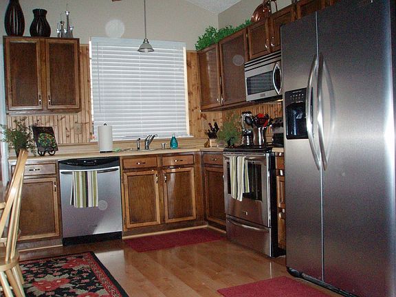 new cabinets, countertops, and subway tile backsplash since