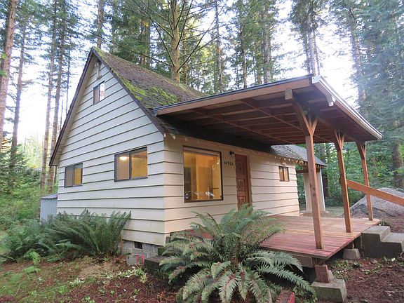 Front of house with carport off to the right