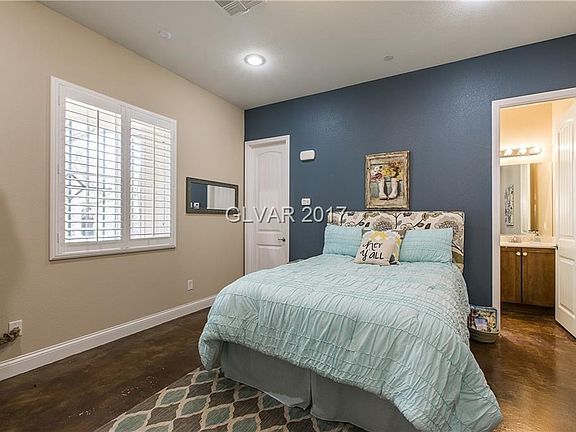 Attached casita with full bathroom, walk in closet, plantation shutters, stamped concrete floors, and separate entry