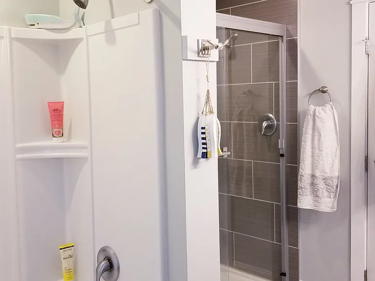 Both showers (one with tub) - En suite master bathroom attached to master bedroom