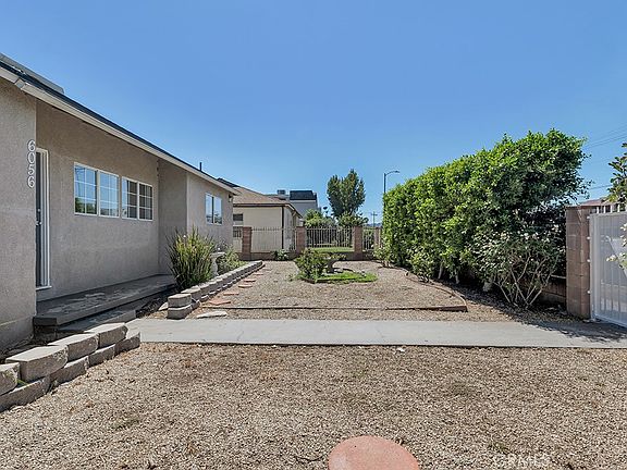 5th image of 6056 Woodman Ave