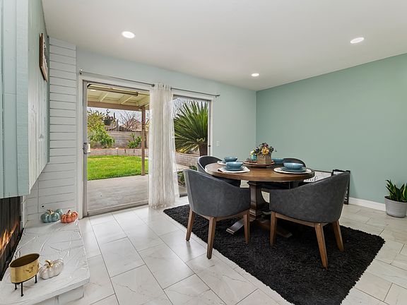 Slider from dining leads into backyard