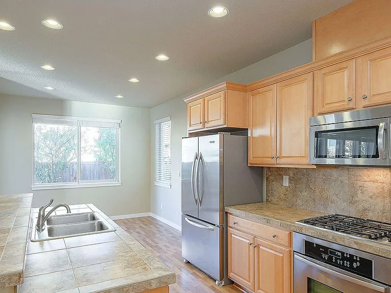6387 NE Meadowgate Ct — Photo 8
