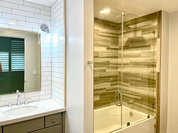 Master bathroom with soaker tub and rainfall shower