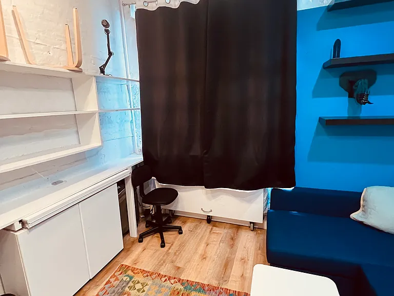 Blackout curtains can darken the space quite well!