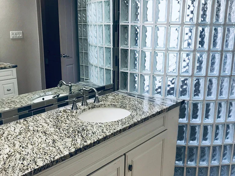 Master bathroom granite vanity her side