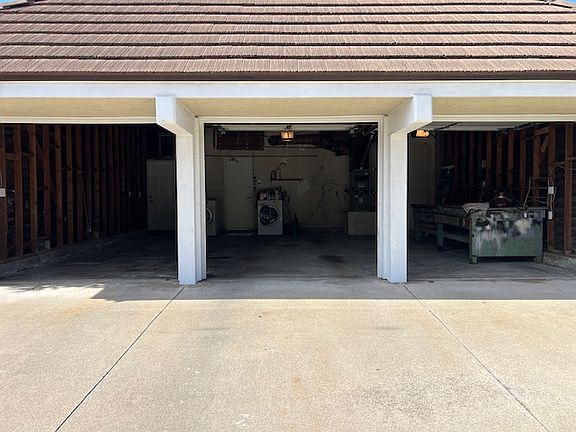 Huge garage with 3 car separate doors