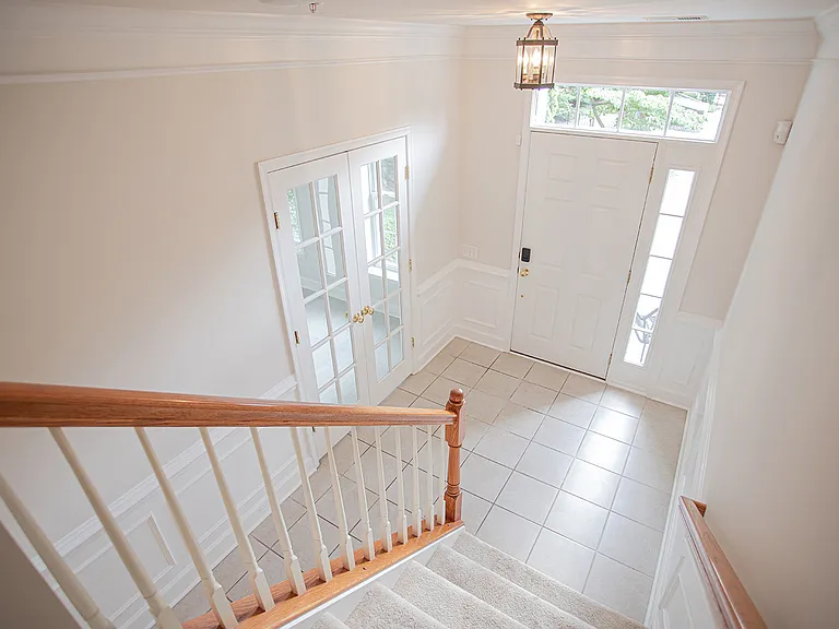 Vaulted ceilings on the ground level open up the space