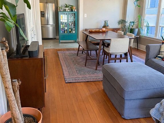 Warm hardwood floors, high ceilings, and abundant natural light. (Furniture not included)