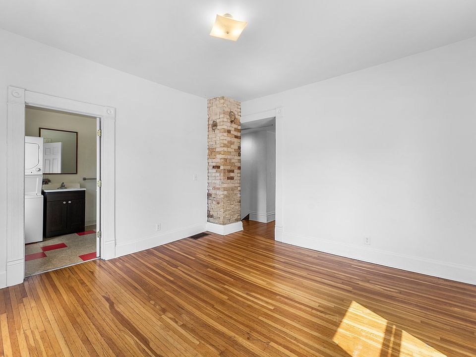 Living room with entry to bathroom