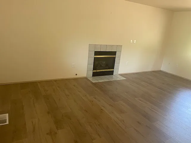 Living room with gas fireplace.