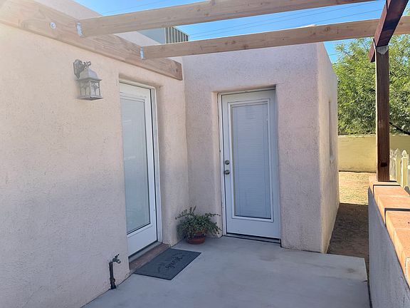 Guest house entrance and path to private gated yard.