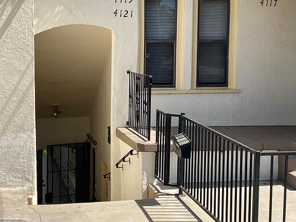 Entrance View. The unit for rent is down a few stairs and then on the right (see open black security gate).